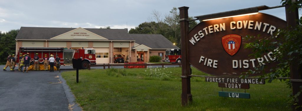 Summit Station, fire apparatus, and the Western Coventry Fire District sign.